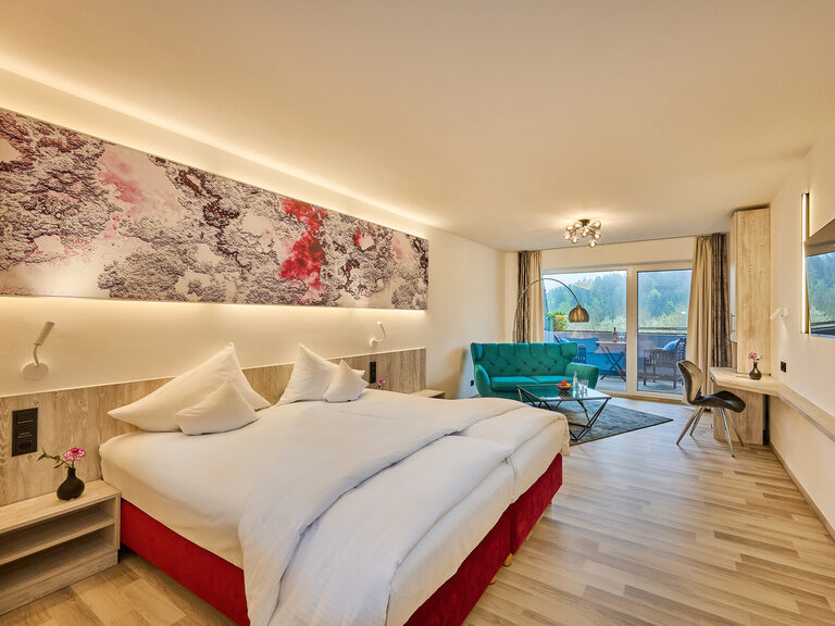 Helles und modern eingerichtetes Hotelzimmer im Hotel Wutzschleife mit Wohlfühlatmosphäre.